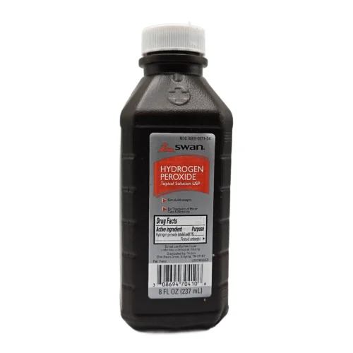 brown bottle of hydrogen peroxide with gray and red label and white cap